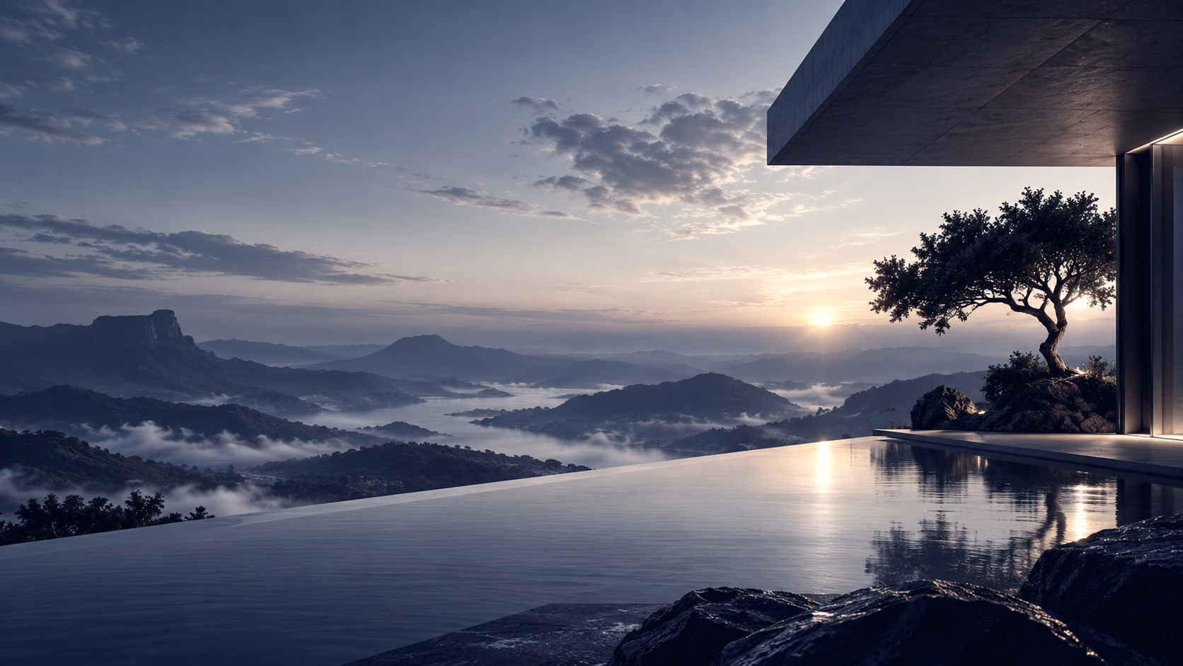 An infinity pool and a lone tree overlooking misty mountains at dawn